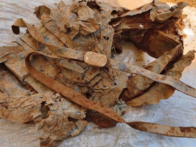 The remains of the 8th martyr were collected in Cha Ly mountain forest, with a female belt as artifact